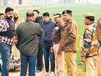 Police officials at the encounter site near Bhikhiwind in Tarn Taran district on Tuesday. (HT Photo)