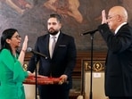 Venezuela's interim President Delcy Rodriguez (L) taking an oath in front of Venezuela's National Assembly President Jorge Rodriguez (R) and Deputy Nicolas Maduro Guerra (C) during a session of the National Assembly in Caracas. Venezuela's interim President Delcy Rodriguez (L) taking an oath in front of Venezuela's National Assembly President Jorge Rodriguez (R) and Deputy Nicolas Maduro Guerra (C) during a session of the National Assembly in Caracas.