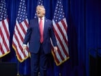 President Donald Trump walks off stage after speaking to House Republican lawmakers during their annual policy retreat.