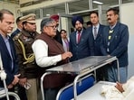 UT administrator Gulab Chand Kataria interacting with patients at Government Medical College and Hospital, Sector 48, in Chandigarh on Monday. (HT Photo)