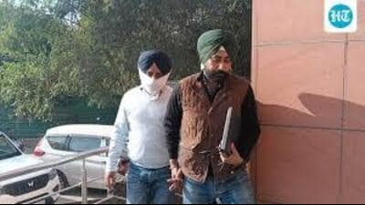 The accused Harpreet Singh Gulati (face covered) was arrested by the vigilance bureau on November 30, 2025. (File)