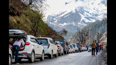 Tourists stranded in a long traffic jam in Manali on Tuesday. (PTI)