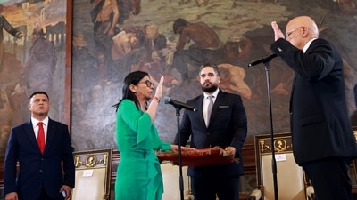 Shots were fired near the Miraflores presidential palace hours after Venezuelan interim .President Delcy Rodriguez was sworn in following the capture of Nicolas Maduro (AFP) Shots were fired near the Miraflores presidential palace hours after Venezuelan interim .President Delcy Rodriguez was sworn in following the capture of Nicolas Maduro (AFP)