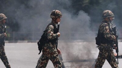 File photo of soldiers of the Nepal Army walking with assault rifles during the protests to condemn the police's deadly crackdown on demonstrators in Kathmandu last year. (Prabin Ranabhat/AFP) File photo of soldiers of the Nepal Army walking with assault rifles during the protests to condemn the police's deadly crackdown on demonstrators in Kathmandu last year. (Prabin Ranabhat/AFP)