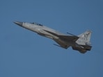 A Pakistani Air Force JF-17 Thunder flies at the Dubai Air Show in Dubai, United Arab Emirates. (AP Photo/Jon Gambrell)