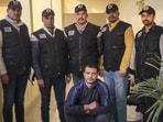 Haryana Special Task Force (STF) personnel produce wanted gangster Aman Bhainswal after his deportation from the United States in Gurugram on Wednesday. (PTI)