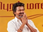 Kanchipuram: TVK leader Vijay greets the gathering during a public meeting, in Kanchipuram, Sunday, Nov. 23, 2025. 