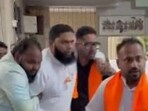 Shiv Sena’s Haji Qureshi was rushed to the hospital by his associates (Videograb)