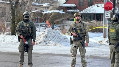 Federal law enforcement officers stand near a roadblock at Portland Avenue and East 32nd Street, Wednesday, Jan. 7, 2026, after reports of a shooting involving federal agents in Minneapolis, where immigration enforcement has been conducting a major crackdown. (AP) Federal law enforcement officers stand near a roadblock at Portland Avenue and East 32nd Street, Wednesday, Jan. 7, 2026, after reports of a shooting involving federal agents in Minneapolis, where immigration enforcement has been conducting a major crackdown. (AP)