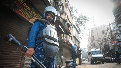 DCP Nidhi Valsan said that the action started around 1 am. "MCD conducted demolition as per the High Court's orders on the encroached land," Valsan said, adding that the police had used minimal force, adding that legal action would be taken against those involved in stone-pelting. (Sanchit Khanna/HT Photo) DCP Nidhi Valsan said that the action started around 1 am. "MCD conducted demolition as per the High Court's orders on the encroached land," Valsan said, adding that the police had used minimal force, adding that legal action would be taken against those involved in stone-pelting. (Sanchit Khanna/HT Photo)