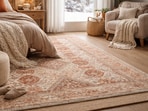 Layered rugs soften cold floors, add texture, and make barefoot mornings warmer and far more comfortable indoors during winter days.(Ai generated)