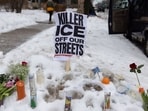 A memorial set up by community members following a fatal shooting by an ICE agent in Minneapolis on Thursday.
