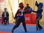 Students taking part in the Gatka event during the ongoing 69th national school games at PAU in Ludhiana on Thursday. (Manish/HT)