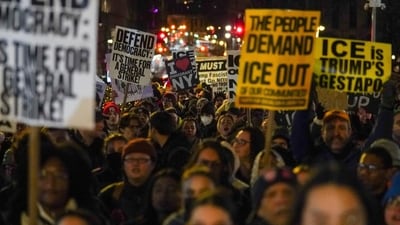 People participate in a protest following Renee Nicole Good's death after she was shot by a Federal immigration officer this morning in Minneapolis, Wednesday, Jan. 7, 2026, in New York. (AP Photo/Ryan Murphy) (AP) People participate in a protest following Renee Nicole Good's death after she was shot by a Federal immigration officer this morning in Minneapolis, Wednesday, Jan. 7, 2026, in New York. (AP Photo/Ryan Murphy) (AP)