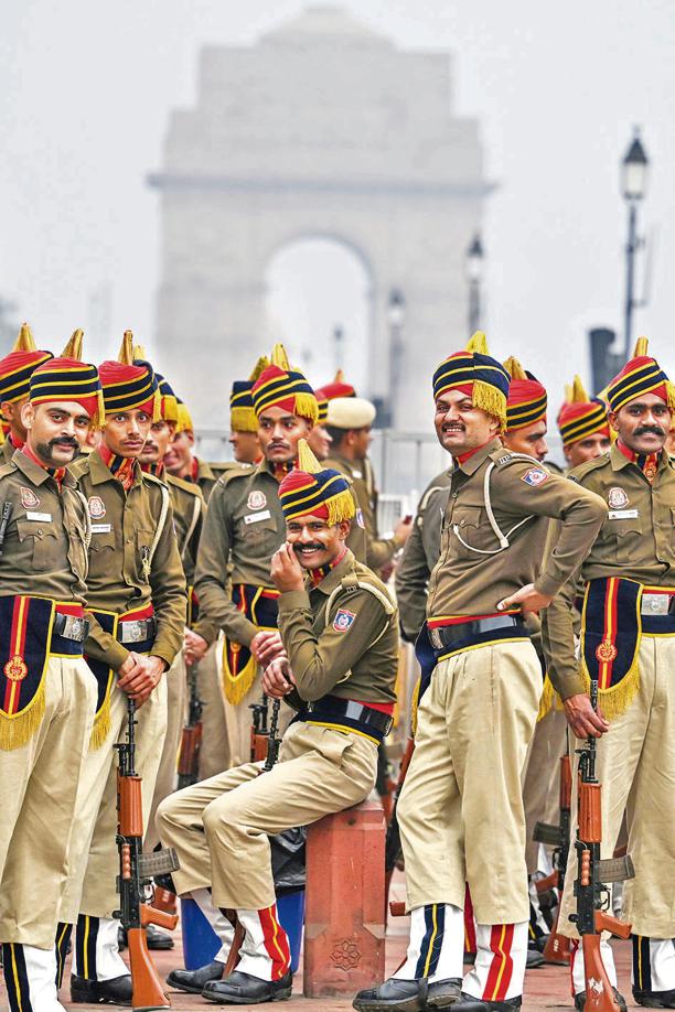 A Delhi Police contingent pauses for a quick photograph between their march-past practice sessions at Kartavya Path ahead of Republic Day. (Photo: RAJ K RAJ / HT) A Delhi Police contingent pauses for a quick photograph between their march-past practice sessions at Kartavya Path ahead of Republic Day. (Photo: RAJ K RAJ / HT)
