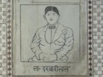A corner wall shows something unexpected—a marble tile is etched with the likeness of a man in western-style suit and bow tie. The underlying inscription identifies the figure as L. Darvari Lal. (HT)