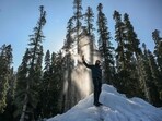 A man takes selfies on icicles, on a cold winter morning in Baramulla on Thursday. (AFP) A man takes selfies on icicles, on a cold winter morning in Baramulla on Thursday. (AFP)