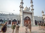 Police personnel stand guard at Faiz-e-Ilahi Masjid near Turkman Gate, in New Delhi on Friday. 