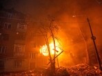 One of those dead was an emergency medic who had arrived at a suburban apartment hit by two drones in succession. 