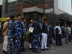 Security force personnel stand guard in front of I-PAC office while Enforcement Directorate (ED) conducts the raid at Infinity Waterside building, Sector V, Salt Lake in Kolkata. (Photo by Samir Jana/ Hindustan Times)