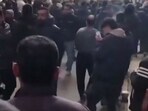 This grab taken on January 6, 2026, from UGC images posted on social media the same day shows people gathering in the Tehran bazaar during clashes between security forces and protesters.