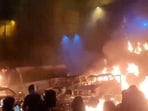 Protesters gather as vehicles burn, amid evolving anti-government unrest, in Tehran, Iran, in this screen grab obtained from a social media video released on January 9