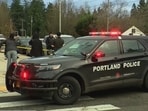 A Portland Police car is seen after reports of two people being shot by federal agents. A Portland Police car is seen after reports of two people being shot by federal agents.
