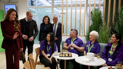Britain's Prince William (2nd L), Prince of Wales and Catherine (L), Princess of Wales meet with volunteers of Imperial Health Charity during a visit to Charing Cross Hospital in west London on January 8, 2026, to highlight the work of NHS staff and volunteers. (Photo by Isabel Infantes / POOL / AFP) (AFP) Britain's Prince William (2nd L), Prince of Wales and Catherine (L), Princess of Wales meet with volunteers of Imperial Health Charity during a visit to Charing Cross Hospital in west London on January 8, 2026, to highlight the work of NHS staff and volunteers. (Photo by Isabel Infantes / POOL / AFP) (AFP)