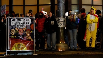 Demonstrators hold signs outside teh Portland ICE facility during a protest following a shooting by US federal agents that injured two people in Portland, Oregon, U.S., January 8, 2026. REUTERS/John Rudoff (REUTERS)