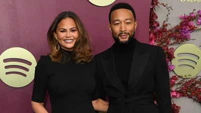 US singer-songwriter John Legend and his wife Chrissy Teigen attend the Hollywood Reporter and Spotify Golden Globe nominees night at The Lot at Formosa in Los Angeles on January 8, 2026. (Photo by Unique Nicole / AFP) (AFP) US singer-songwriter John Legend and his wife Chrissy Teigen attend the Hollywood Reporter and Spotify Golden Globe nominees night at The Lot at Formosa in Los Angeles on January 8, 2026. (Photo by Unique Nicole / AFP) (AFP)