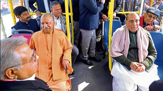 Defence minister Rajnath Singh and chief minister Yogi Adityanath at the inauguration of the Ashok Leyland EV plant in Lucknow on Friday. (HT Photo)