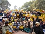 AAP workers holding a protest outside the house of SAD chief Sukhbir Singh Badal at Badal village in Lambi, Muktsar. (HT) AAP workers holding a protest outside the house of SAD chief Sukhbir Singh Badal at Badal village in Lambi, Muktsar. (HT)