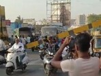 Height barrier installed near Aai Mata Mandir on Shatrunjay Road to enforce ban on heavy vehicles was knocked down by rule-violating truck on Friday. (HT)