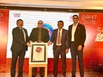 IPS Amit Verma (in broad tie) and ASP Rahul Srivastava (extreme right holding the award) receiving the award in New Delhi (HT Photo)