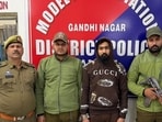 J&K police with arrested accuse on Friday. (HT Photo)