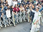 West Bengal chief minister Mamata Banerjee leads a protest rally against the Enforcement Directorate raids, in Kolkata on Friday. (ANI)