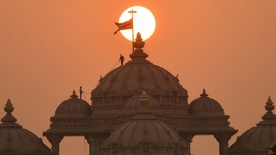 Gram it: Workers atop the dome of Swaminarayan Akshardham Temple appear miniature-like during the sunset hour in Delhi. A massive 108-foot statue of Neelkanth Varni, depicting young Swaminarayan in deep meditation, is being installed at the Akshardham Temple, and will be celebrated at a ceremony planned for March this year. (Photo: ANI)