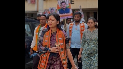 BJP candidate Aishwarya Pathare, a COEP pass-out engineer, contesting from Ward 3, on Saturday, outlined a time-bound plan for her first 100 days if elected, focusing on basic civic services, cleanliness and citizen outreach. (HT PHOTO) BJP candidate Aishwarya Pathare, a COEP pass-out engineer, contesting from Ward 3, on Saturday, outlined a time-bound plan for her first 100 days if elected, focusing on basic civic services, cleanliness and citizen outreach. (HT PHOTO)