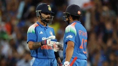 Virat Kohli and Rohit Sharma bump fists during their innings. (REUTERS)