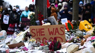 People stop to observe the site where Renee Nicole Good was killed as they march to memorialize her and against the influx of federal agents in the city on January 10, 2026 in Minneapolis, Minnesota. (Getty Images via AFP) People stop to observe the site where Renee Nicole Good was killed as they march to memorialize her and against the influx of federal agents in the city on January 10, 2026 in Minneapolis, Minnesota. (Getty Images via AFP)