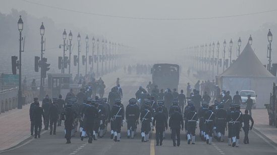 Indian Air Force contingent marches during rehearsals for the upcoming Republic Day parade amid fog and cold weather.&nbsp;(Raj K Raj / Hindustan Times)