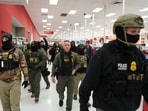 U.S. Border Patrol boss Gregory Bovino walks through a Target store Sunday, Jan. 11 in St. Paul, Minnesota.