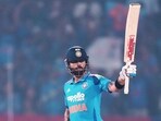  Virat Kohli celebrates his fifty runs during the first ODI between India and New Zealand in Vadodara.