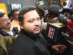 Leader of Oppostion and RJD leader Tejashwi Yadav speaks with mediapersons during his arrival at the Jaiprakash Narayan Airport in Patna on Sunday. (Santosh Kumar/HT)