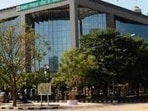 The Mohali Municipal Corporation (MC) House on Friday resolved to meet the Punjab local government secretary to seek permission for carrying out long-pending development works in private housing societies, amid allegations by Congress councillors that the Aam Aadmi Party (AAP)-led state government is deliberately stalling approvals. (HT) The Mohali Municipal Corporation (MC) House on Friday resolved to meet the Punjab local government secretary to seek permission for carrying out long-pending development works in private housing societies, amid allegations by Congress councillors that the Aam Aadmi Party (AAP)-led state government is deliberately stalling approvals. (HT)