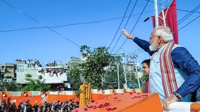 Prime Minister Narendra Modi was seen riding an open-top vehicle in the Somnath temple's Shaurya Yatra on Sunday. (DPR PMO) Prime Minister Narendra Modi was seen riding an open-top vehicle in the Somnath temple's Shaurya Yatra on Sunday. (DPR PMO)