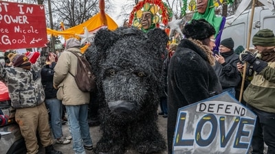 Demonstrators during a protest in Minneapolis, Minnesota, US, on Saturday, Jan. 10, 2026. Thousands marched Saturday in Minneapolis to the site where a federal agent shot and killed Ren�e Nicole Good during a confrontation, heightening political divisions around the Trump administration's immigrant crackdown. Photographer: Victor J. Blue/Bloomberg (Bloomberg)