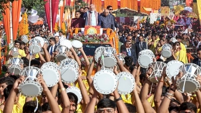 A group of men playing 'damru' and 108 horses drawn from different parts of Gujarat were part of the Somnath temple's Shurya Yatra. (DPR PMO) A group of men playing 'damru' and 108 horses drawn from different parts of Gujarat were part of the Somnath temple's Shurya Yatra. (DPR PMO)