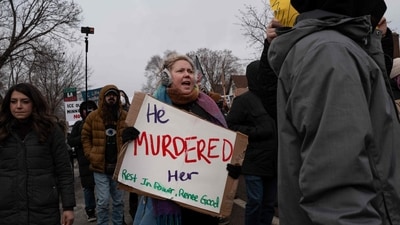MINNEAPOLIS, MINNESOTA - JANUARY 10: Thousands of demonstrators march from Powderhorn Park past the site where Renee Good was killed on January 10, 2026 in Minneapolis, Minnesota. Good was fatally shot by an immigration enforcement agent during an incident in south Minneapolis on January 7.   Scott Olson/Getty Images/AFP (Photo by SCOTT OLSON / GETTY IMAGES NORTH AMERICA / Getty Images via AFP) (Getty Images via AFP)