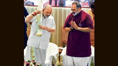 Union Home Minister Amit Shah with Kerala Bharatiya Janata Party (BJP) President Rajeev Chandrasekhar during a meeting with the newly elected party representatives of local bodies, in Thiruvananthapuram, on Sunday. (PTI)